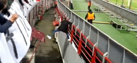 Video: Crowd assist allows Russian pitch invader escape match stewards