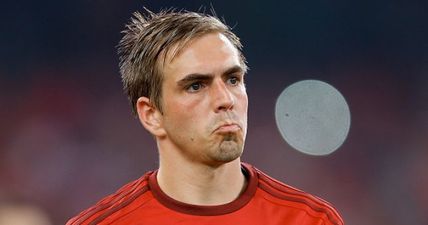 PIC: Philipp Lahm looks absolutely tiny next to Per Mertesacker on German TV