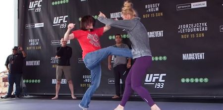 WATCH: Holly Holm lets fan repeatedly kick her in the gut ahead of Ronda Rousey fight