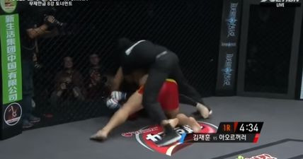 WATCH: Herb Dean had his work cut out for him as he struggled to end Chinese heavyweight bout