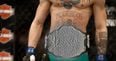 There’s something odd going on with Conor McGregor’s status as featherweight champion on UFC.com