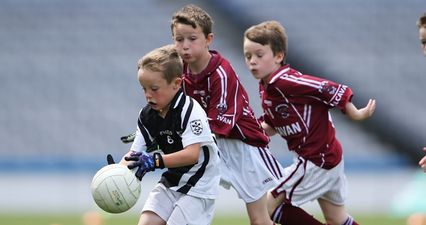 Classic GAA picture of the big lad marking the wee lad in the Galway Féile is hilarious