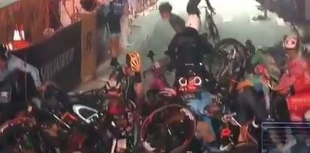 WATCH: Motorcycle stalls, causes absolutely huge bicycle pile-up