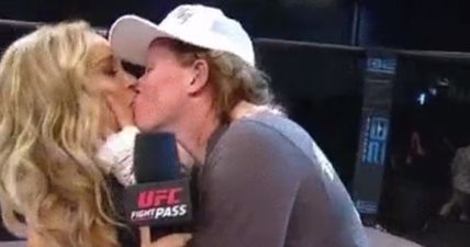 WATCH: Tonya Evinger with the vomit in a bucket/kiss the announcer combination at Invicta 17