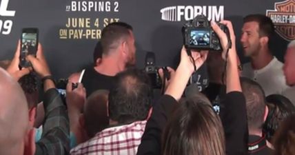 WATCH: Michael Bisping and Luke Rockhold have to be held apart during post-fight altercation