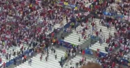 VIDEO: Shameful scenes as Russian fans charge at England supporters inside the stadium after final whistle