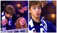 Frustrated young Porto fan accidentally bashes girl on the head as he reacts to late missed chance