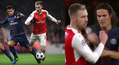 WATCH: Aaron Ramsey’s jaw just about remains intact after being flicked by Edison Cavani