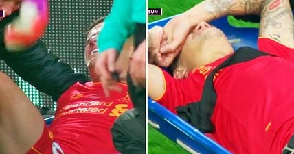 Liverpool fans fear Philippe Coutinho’s season is over after he is stretchered off with leg in a brace