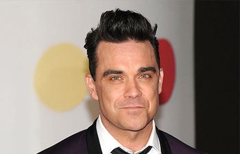 Robbie Williams denied Danish football fans one of the biggest games in their 2003 calendar