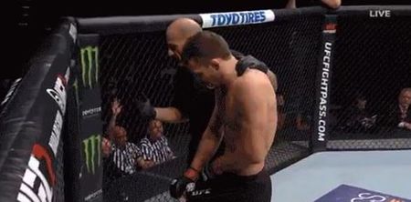 WATCH: UFC fighter forced to drop his shorts in Octagon after cup breaks, commentators crack up