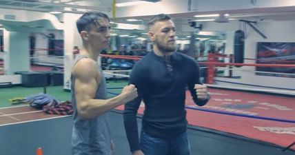 WATCH: Conor McGregor runs into Michael Conlan as he hones his boxing technique in California