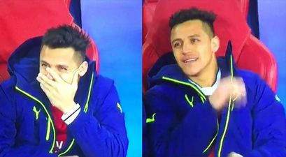 WATCH: Alexis Sanchez tries to hide his laughter as Arsenal teammates suffer another humiliation