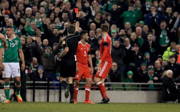 In a game which could deliver nothing but aggression, Neil Taylor crossed the line for Wales