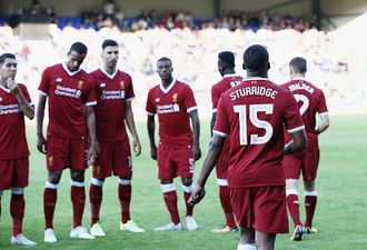 Liverpool have officially launched their new third kit, and it might just blind you