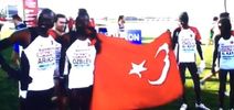 Turkey’s winning team at European Cross Country hold flag upside down