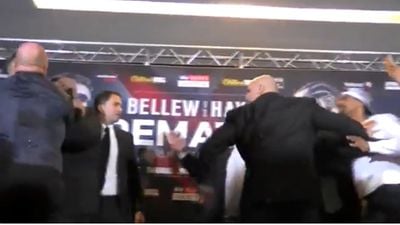 Security staff separate Tony Bellew and David Haye after heated staredown