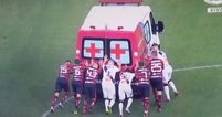 Ambulance breaks during Brasiliero Serie A game and players help to get it off