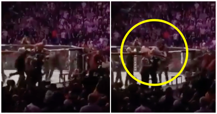 McGregor was on top of cage trading blows before he was attacked from behind