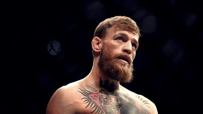 Defiant Conor McGregor shows post-fight damage