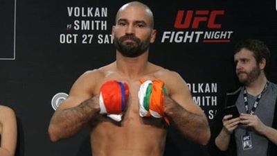 Artem Lobov stays true to his word and gives Michael Johnson his money back