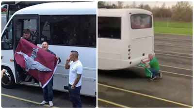 Ireland fan pins tricolour to back of Northern Ireland bus carrying Parachute Regiment flag