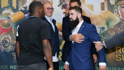 Jono Carroll had to be held back after fiery staredown with Tevin Farmer