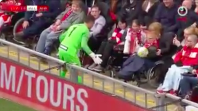 Jerzy Dudek halts Liverpool Legends match to play with a disabled fan