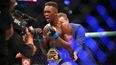 Israel Adesanya picks Robert Whittaker apart to become middleweight champion