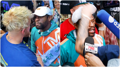 Jake Paul set upon by Floyd Mayweather and security staff after confrontation