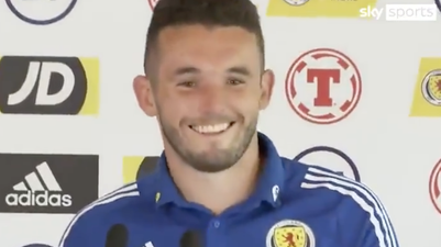 John McGinn asks for a bottle of Coke at Euros press conference