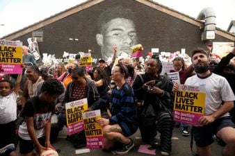 People take knee at vigil outside Manchester mural as kid thanks Rashford for dinner