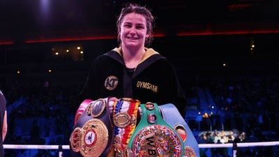 Katie Taylor blitzes Firuza Sharipova to defend world titles in style