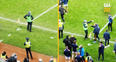 Mickey Moran goes straight over to hug Craig Dias and Robbie Brennan after All-Ireland club win