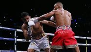 Kell Brook retires Amir Khan with 6th round stoppage