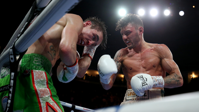 Michael Conlan falls out of the ring in final round KO defeat to Leigh Wood