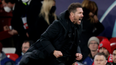 Diego Simeone struck by bottles from crowd after Champions League win