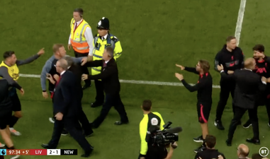 Newcastle coach appears to throw water bottle at Liverpool dugout after late winner