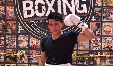 Boxer, 25, dies after knock-out in final minute of fight