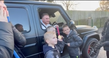 Alexis Mac Allister lets young Brighton fans hold his World Cup medal