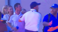 Shane Lowry forced to drag Rory McIlroy away from heated argument after 18th drama