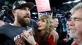 Taylor Swift storms pitch to celebrate as Travis Kelce’s Chiefs reach Super Bowl