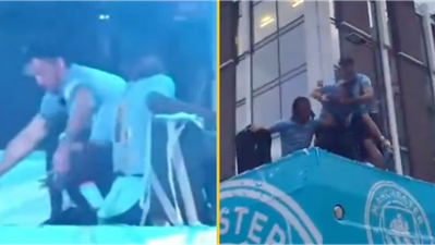 Jack Grealish almost falls off bus twice during Man City trophy parade